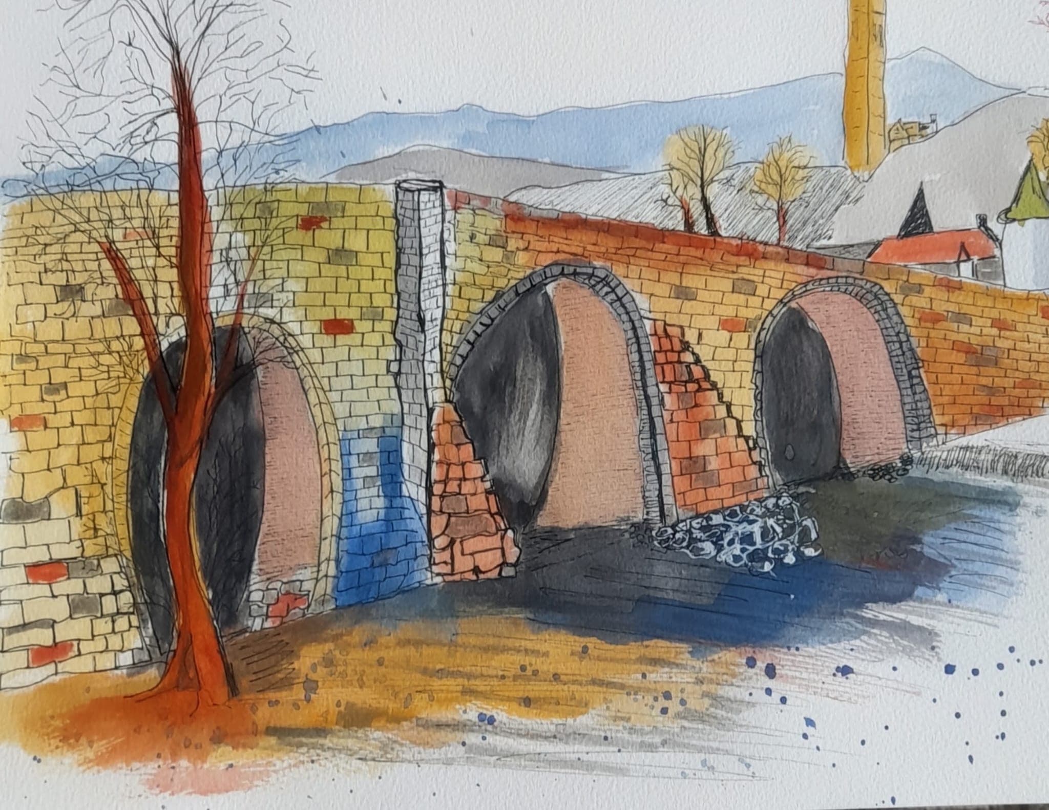 Watercolour of a three-arched stone bridge over a river with an autumn tree
